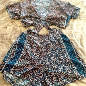 Cute romper with cut side belly and back cut outs